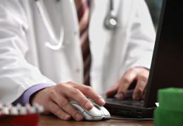 Doctor using computer