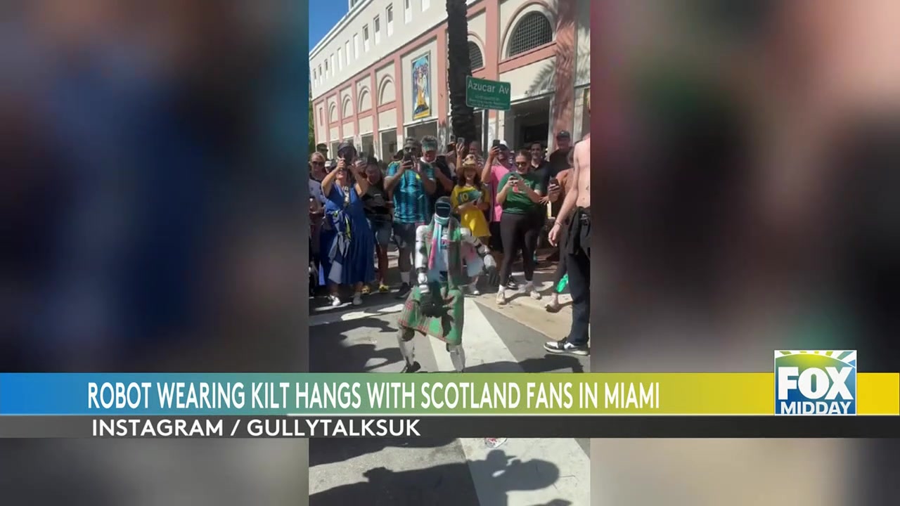 World Cup Fans And A Dancing Robot Parade In Miami Streets